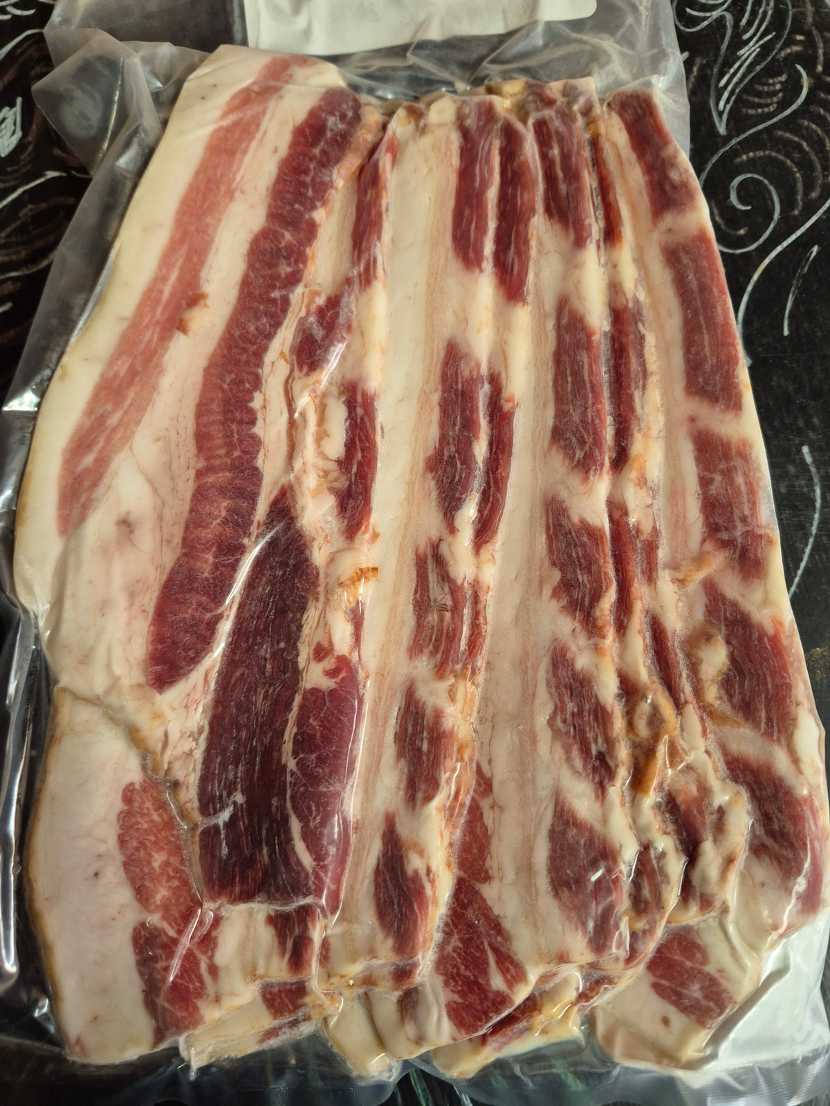 Package of Serenity Valley Farms uncured maple bacon